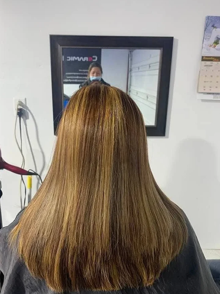 After: Smooth, glossy hair with blended golden highlights.