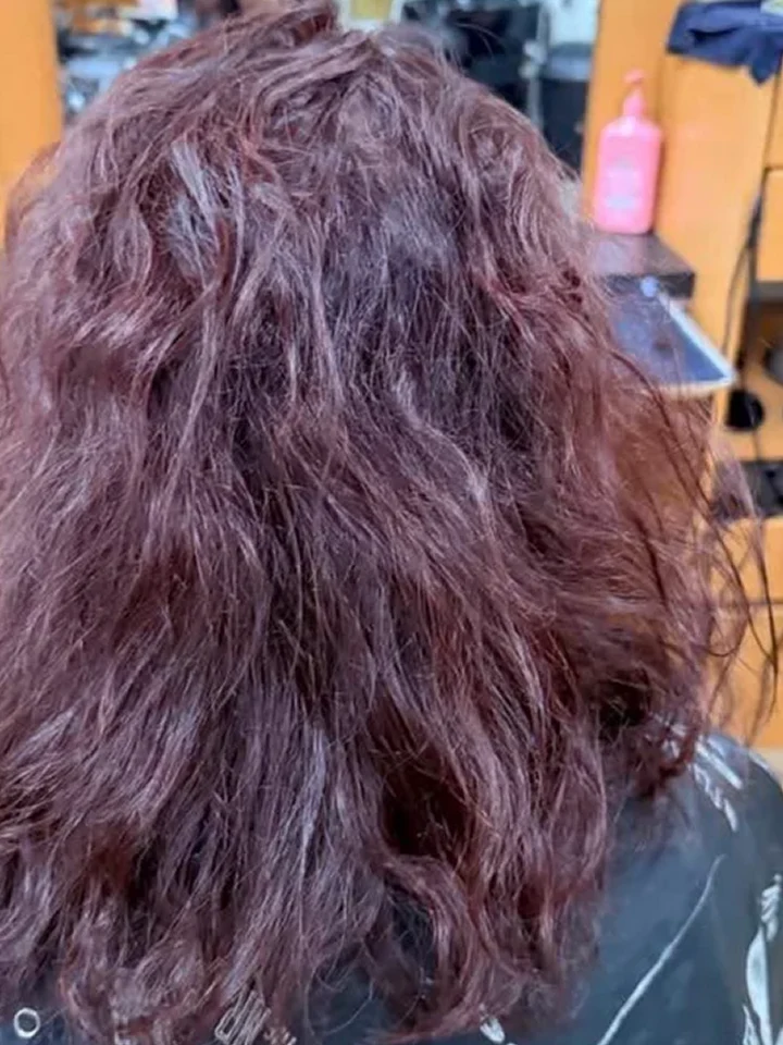 Before: Long, frizzy, wavy burgundy hair.