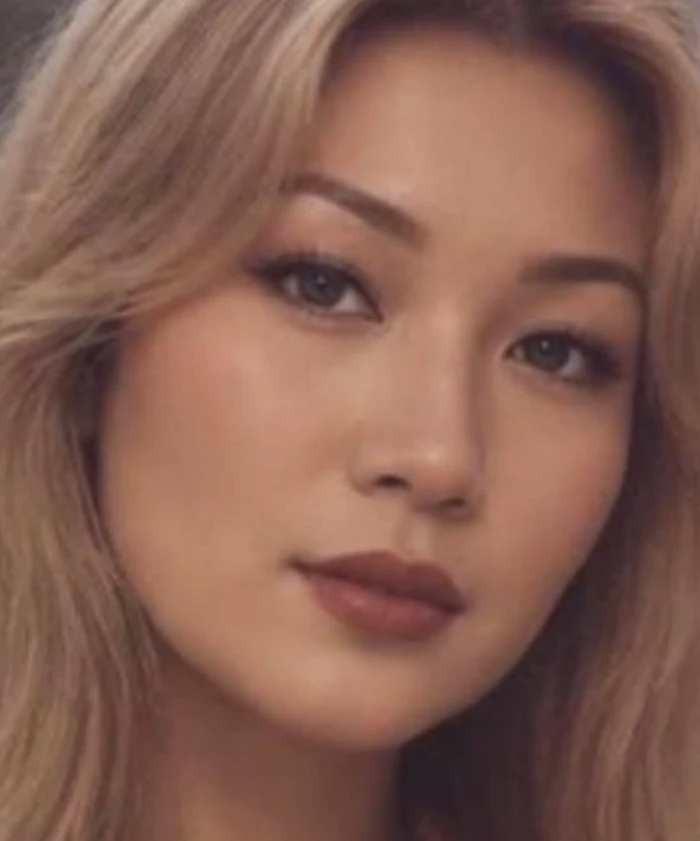 Lorna Malonzo, a stylist with long, wavy blonde hair.